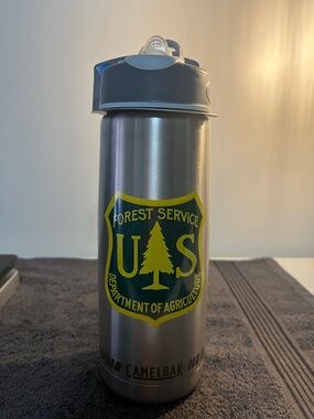 CamelBak Silver Stainless Steel Water Bottle with Yellow USFS Logo and Gray Lid